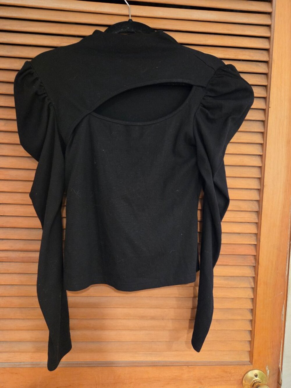Black turtleneck with cutout